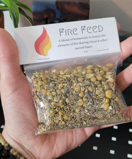 mix of herb in a bag labeled "fire feed"